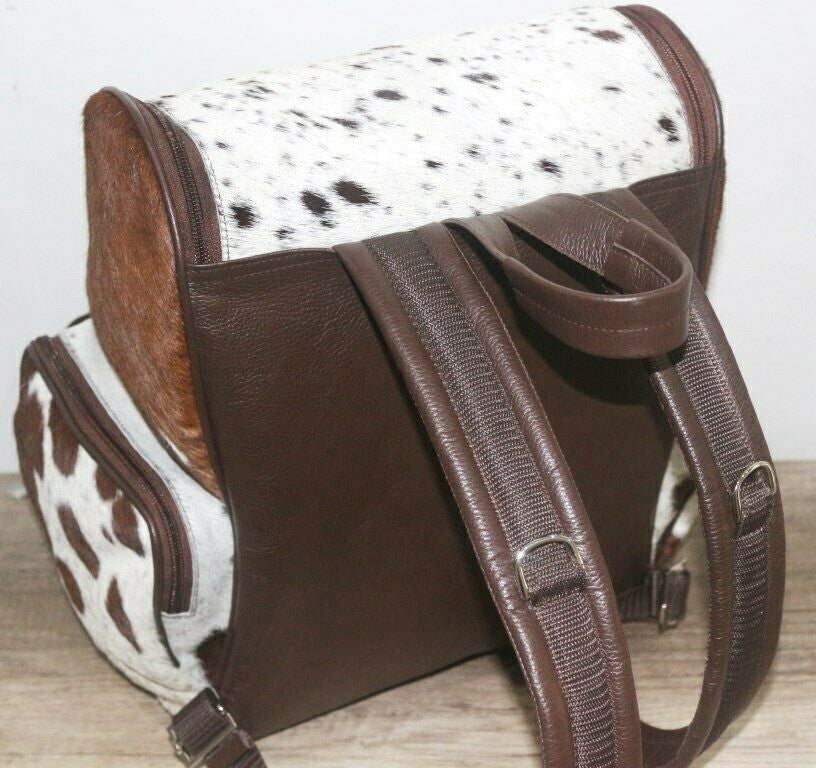 These custom brown white cowhide backpacks are fresh and comes with free shipping Canada wide.