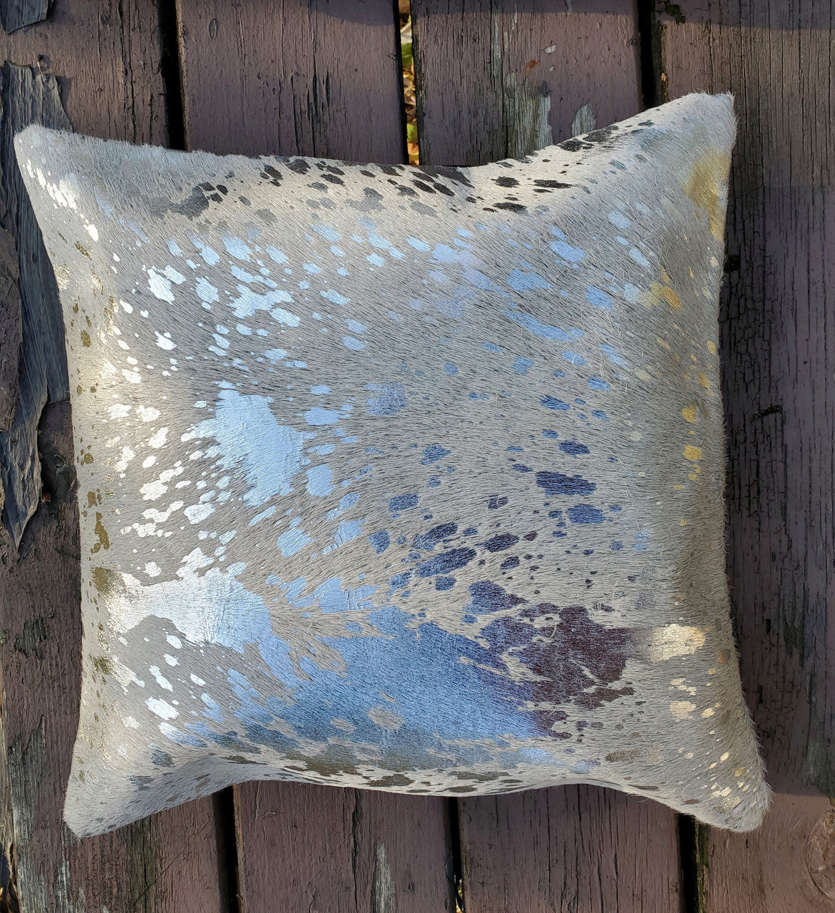 Our silver cowhide pillow covers are in 16 X 16 inches, free shipping all over Canada, these are made from real hair on cow hide metallic acid washed.