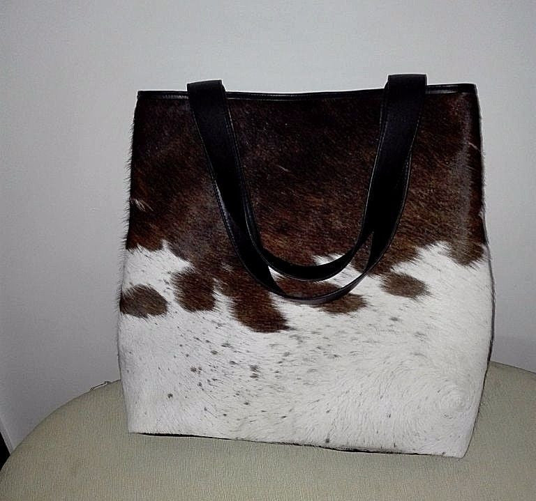 Cowhide tote bag is handmade using real and natural cow fur with a real and premium finish