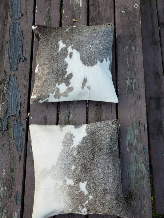 Two 20 X 20 grey cowhide cushion covers very soft and smooth.