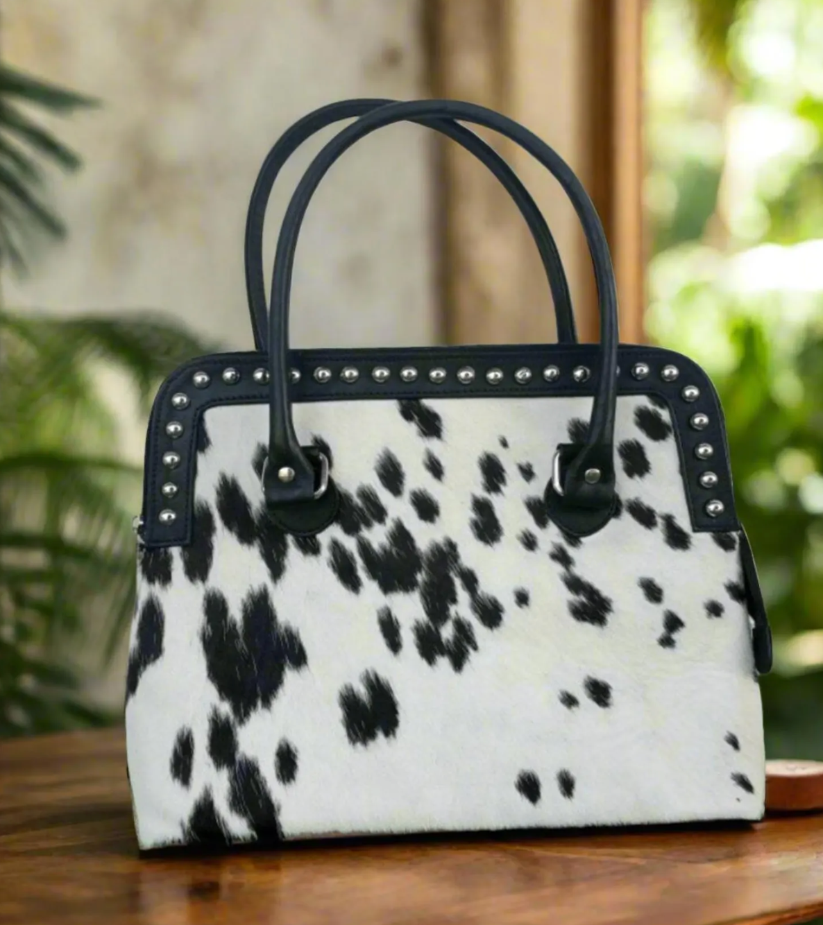 Black White Cowhide Handbag With Rivets