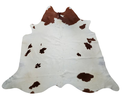 Brown and white cowhide rug has perfected my space and is so soft and high quality.