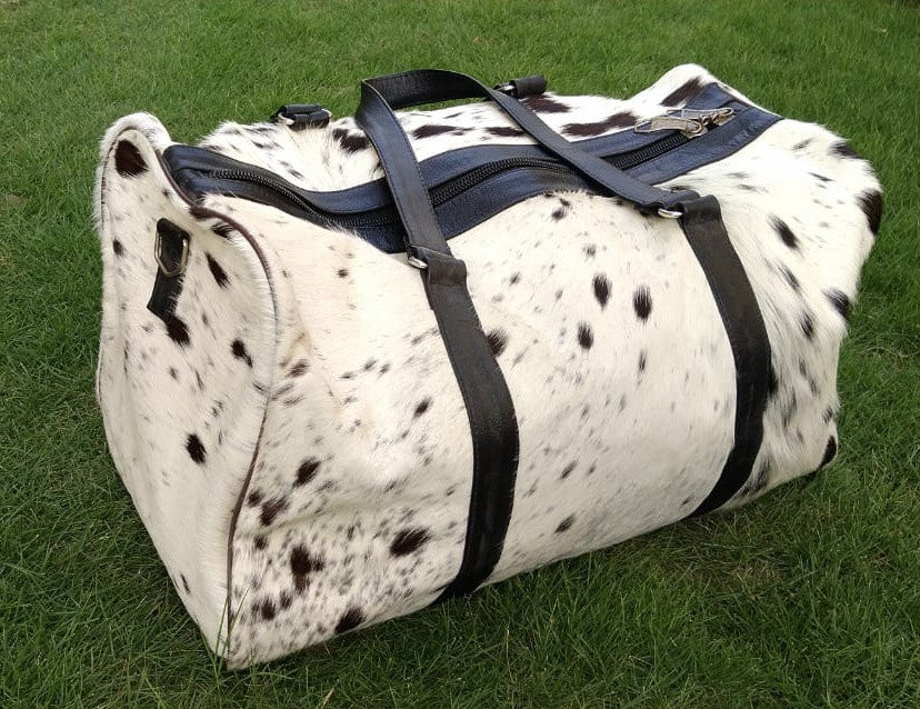 This cow skin handbag is custom made very beautiful in black white cow skin with fair prices and great quality