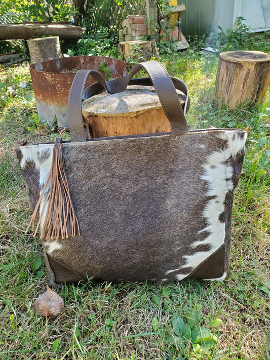 Our new cowhide bag germany in black brown white from real natural cow skin vegetable tanned.