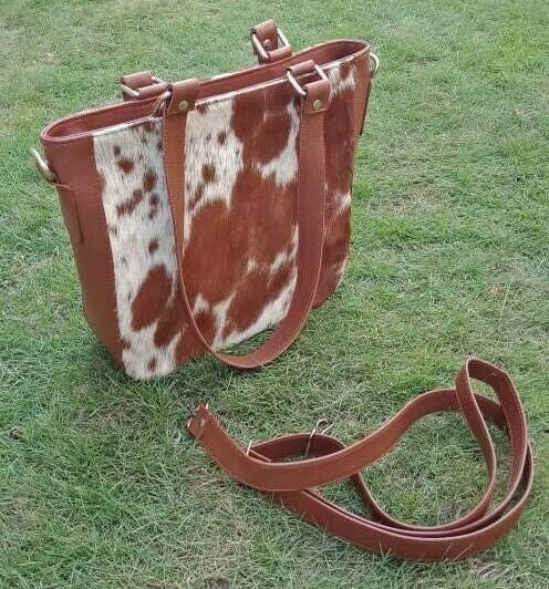 A very high quality cow fur skin bag with amazing texture Fits crossbody style and not to heavy.