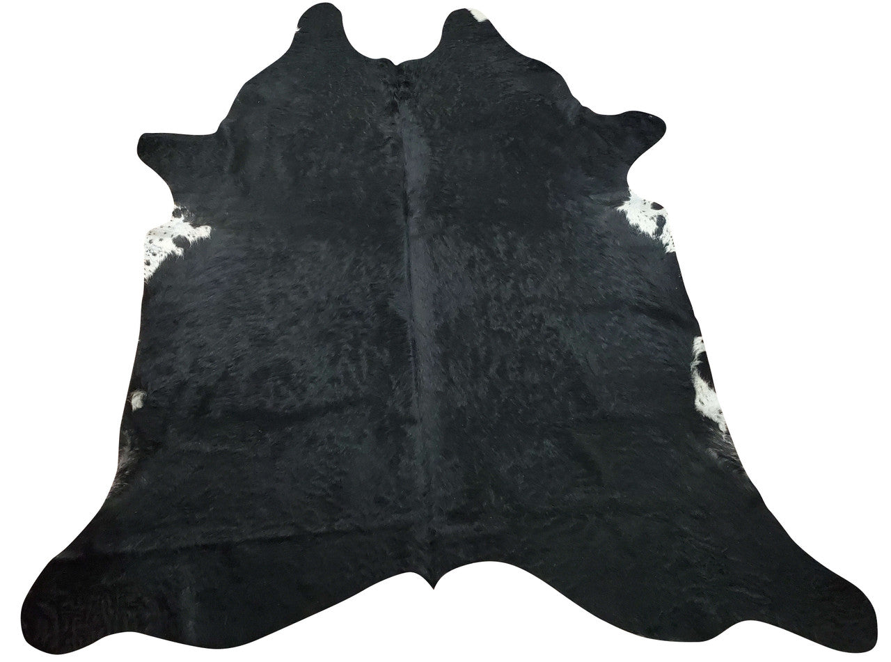 A natural cowhide rug in long hair will create the mood of your decor, very soft and smooth, these black white are art for your room