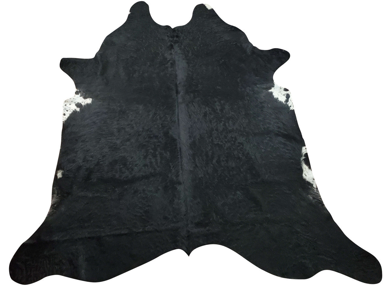 A natural cowhide rug in long hair will create the mood of your decor, very soft and smooth, these black white are art for your room
