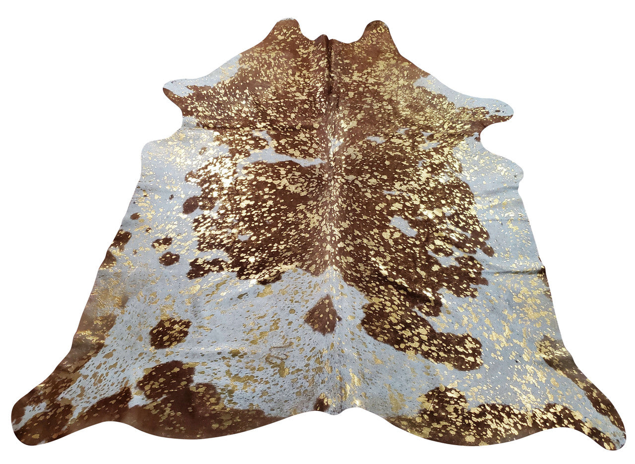 From mid-century to contemporary decor, beautiful gold metallic on brown white cowhide rugs are perfect in atmosphere and bridges the over all style of the space.