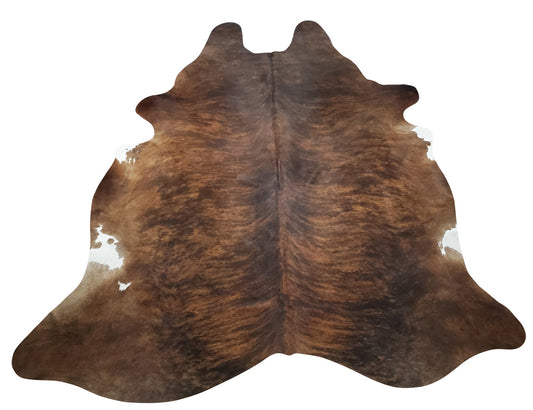 This brown cowhide rug lovely, it will bring the living room together. A perfect love child between sleek Scandinavian style and bohemian.