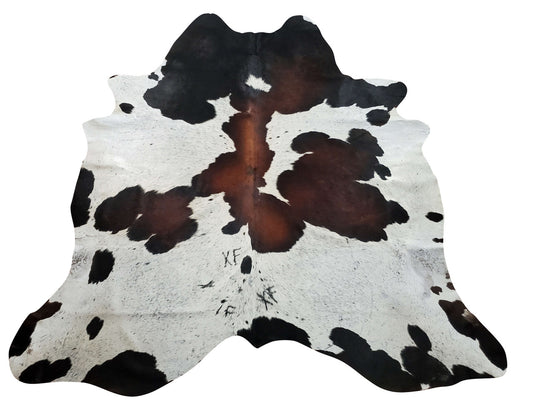This tricolor spotted cowhide rug is truly spectacular and part of our exotic collection, it is so soft and everyone loves walking on these plus the colors are great. 
