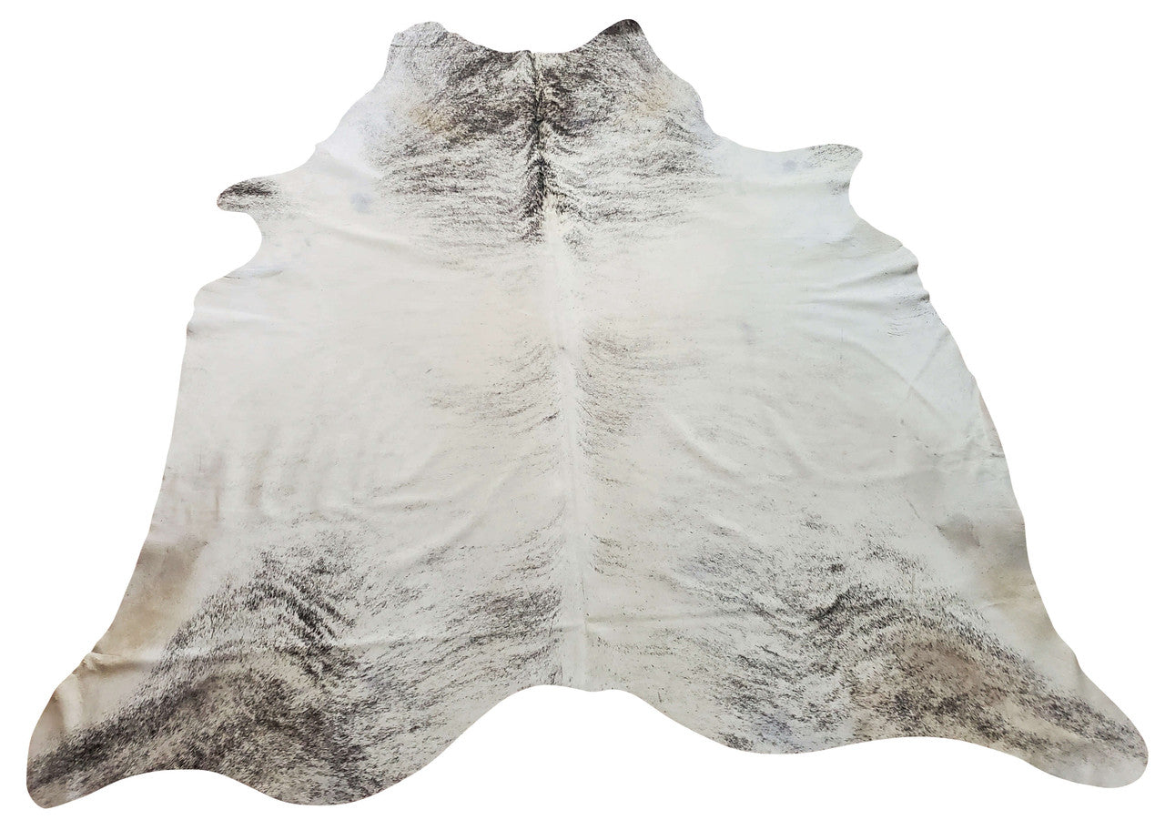 A gorgeous brindle cowhide rug, of exceptional quality will standout in any space.