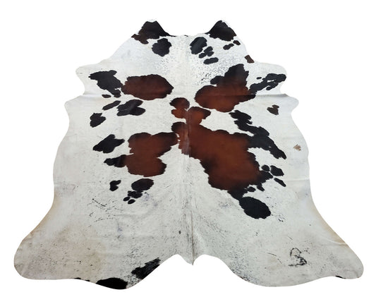 A new and one of a kind extra large cowhide in exotic reddish brown, black speckles and white, perfect for any entryway or high traffic area.
