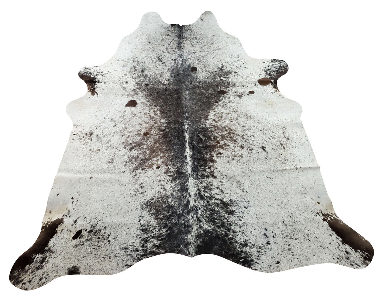 A salt and pepper cowhide rug in a living room is the perfect place for mixing several accent colors. That is genuine and entirely natural with markings that can't be replicated.
