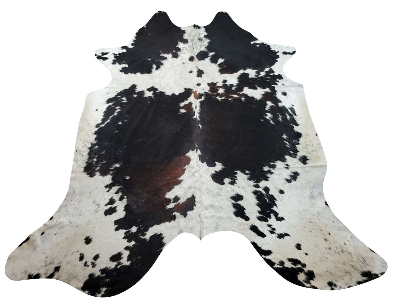 Cowhide rug in a beautiful brown and white will charm your living room and even your truck interior.