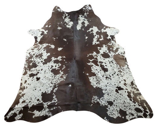 The tricolor cowhide rug is a great option for adding vibrant colors to your space, its natural, real and small size is perfect for any room.