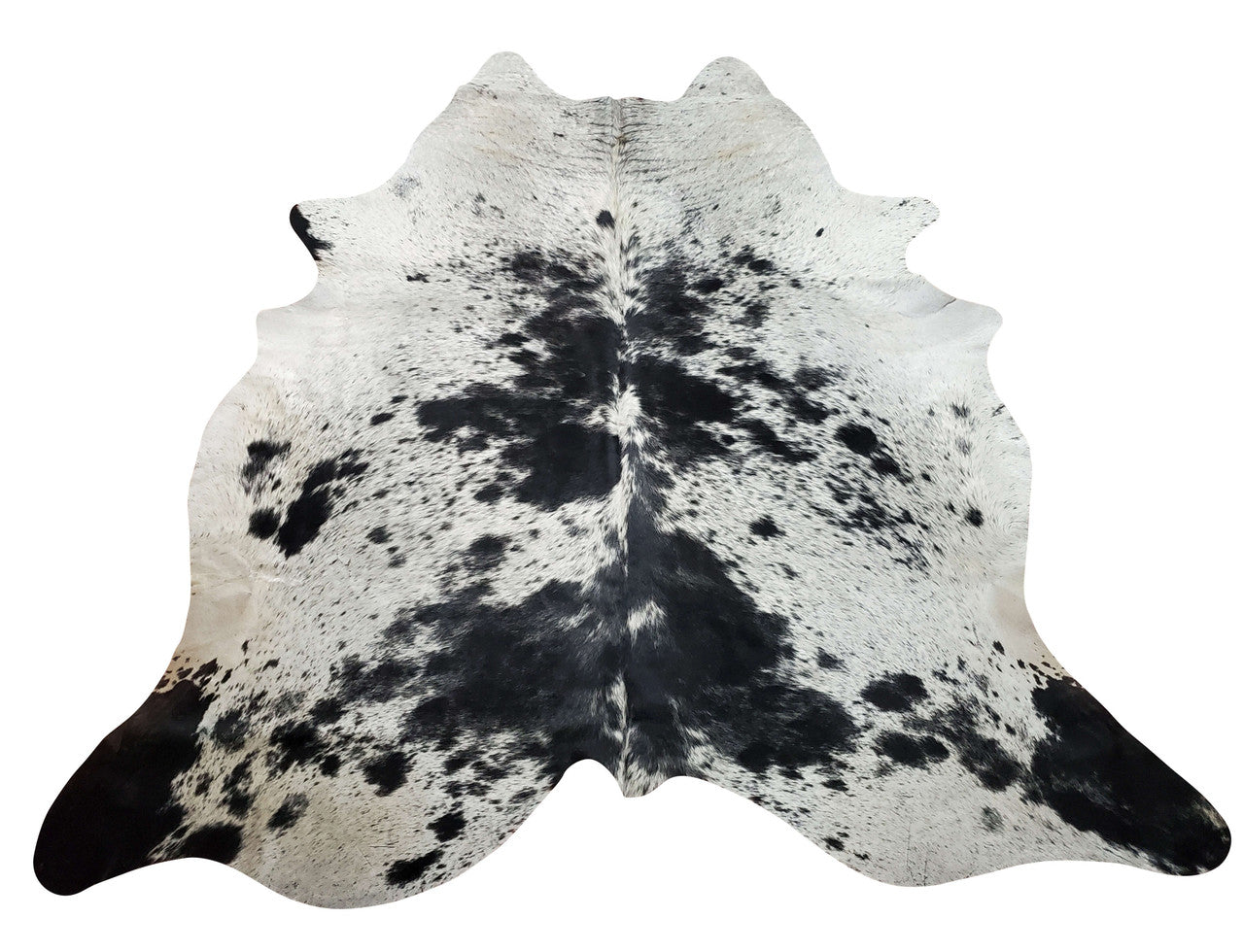 The marvelous black and white color of this elegantly patterned cowhide rug will polish any room with its soft texture and velvety feeling.