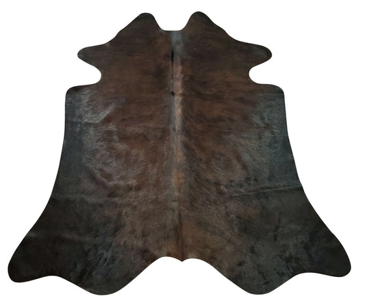 Small dark cowhide rug that looks great on the wooden floor it even has a nice brand or stamp, very soft and perfect for kids and pets. 
