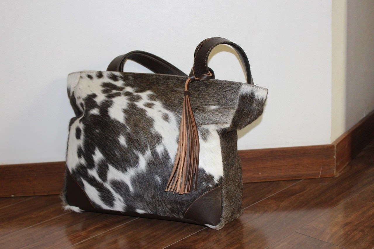 handmade to order cowhide purse duffel back pack
