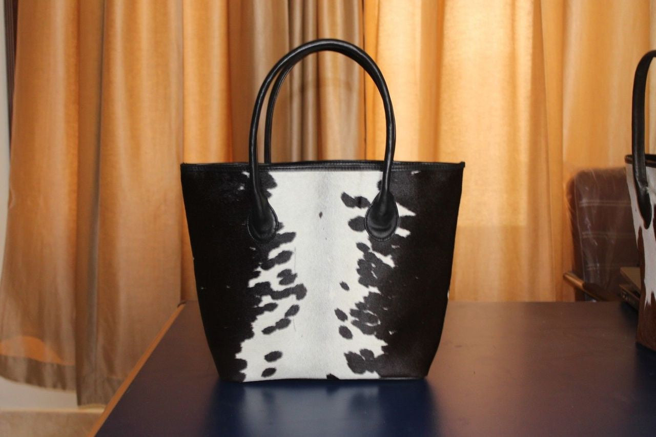 Real Cowhide Fur Hand bag made from natural cow hide perfect for outdoors.