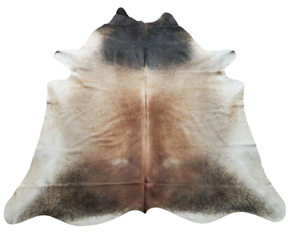 This tan cowhide area rug is small and in mostly grey with some tan marking for your cottages and country house. 
