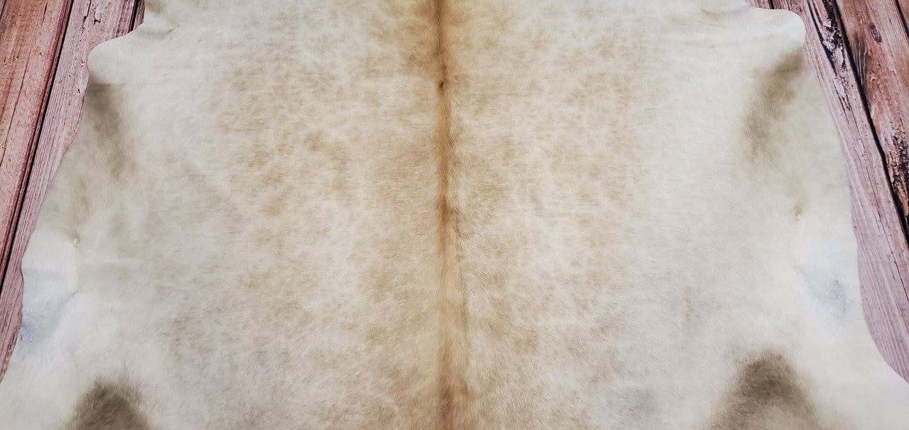 If you are planning instagram or pinterest inspired living room, beige cowhide is a perfect choice for any space.