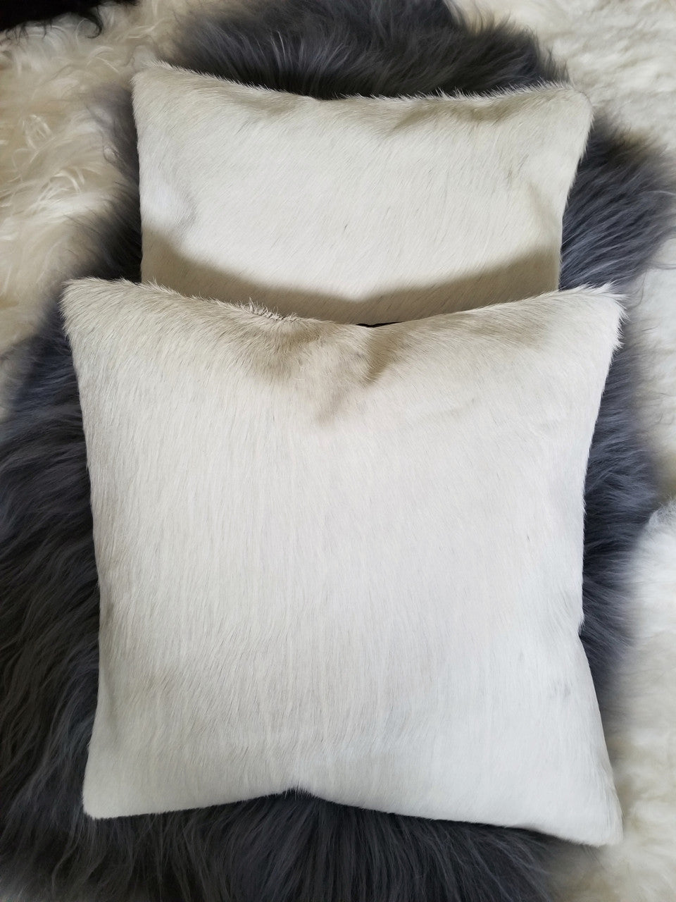 This one of its kind real cowhide pillow cover are great for any mancave or rustic living room.