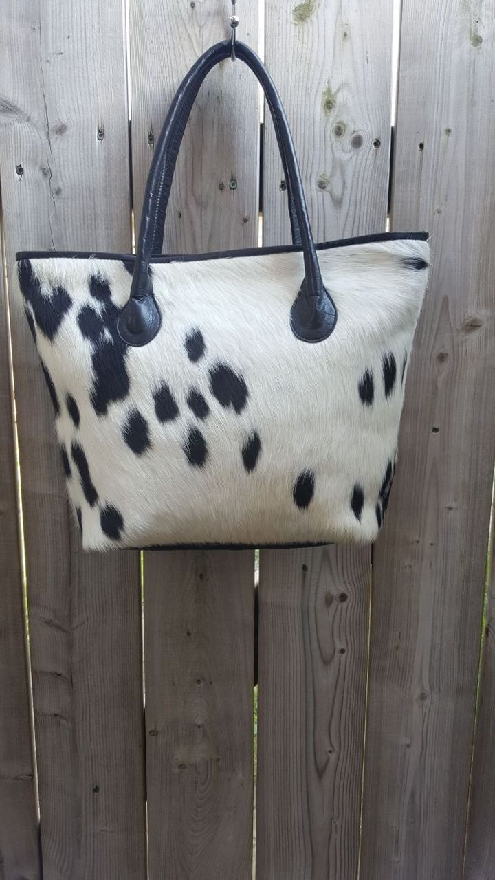 if you are looking for Christmas gift, these cowhide bags are perfect for your daily hustle.