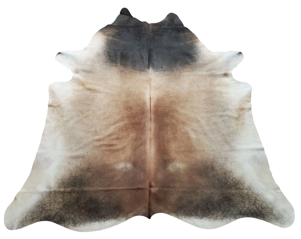 This tan cowhide rug is extraordinarily vibrant and makes a living room or country house exotic, so soft to walk on and smooth to sit, real and natural.
