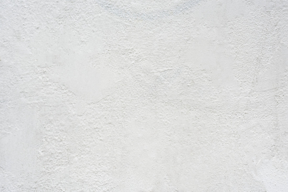 white textured plaster wall surface