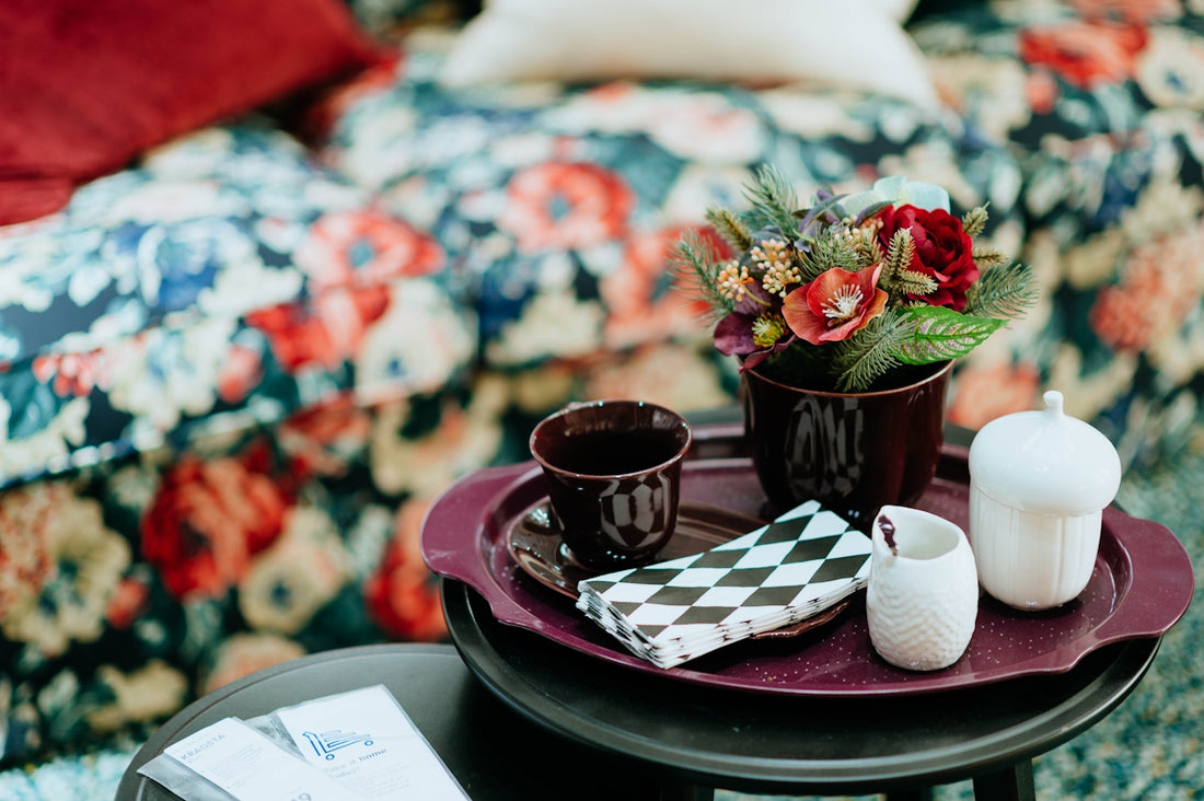 selective focus photography of brown ceramic teacup on tray