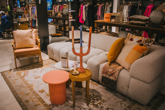 a living room filled with lots of furniture