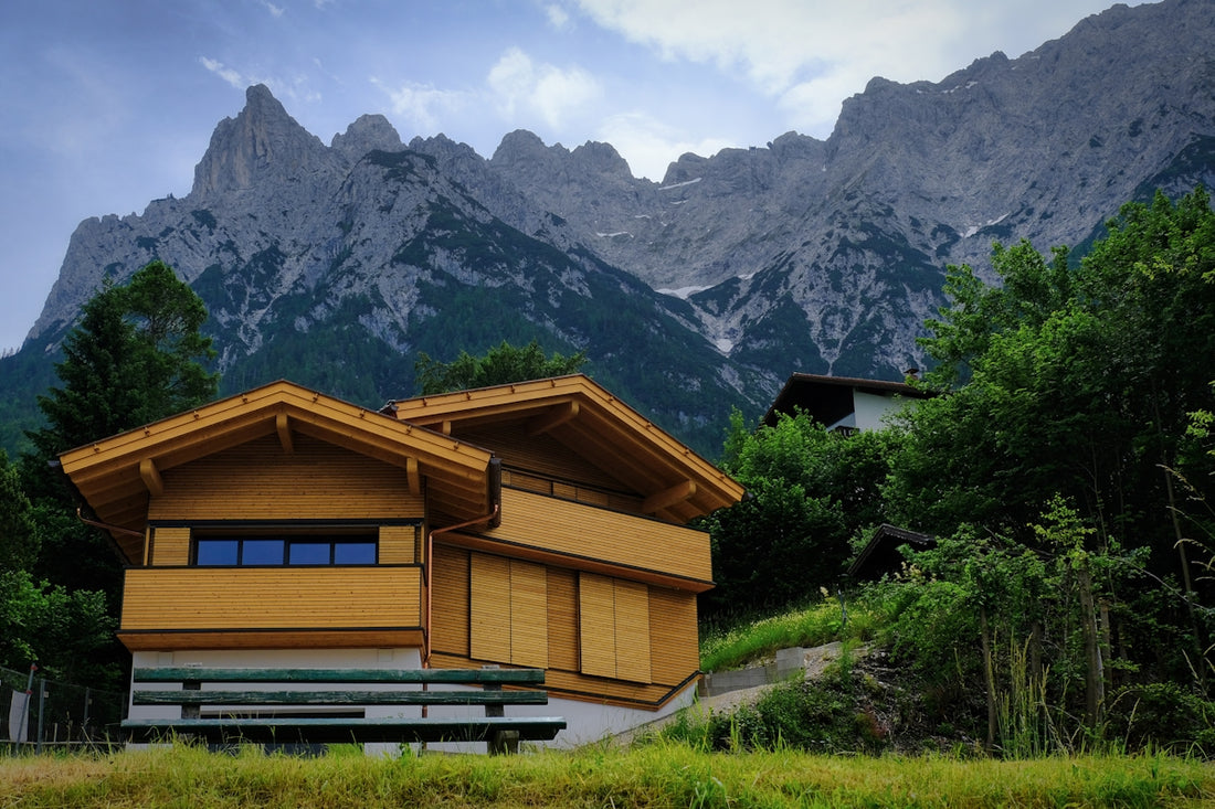 Wooden houses nestled in the mountains.