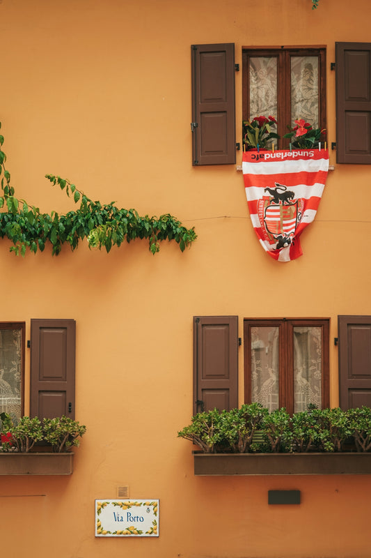 A building with windows and decorative features.