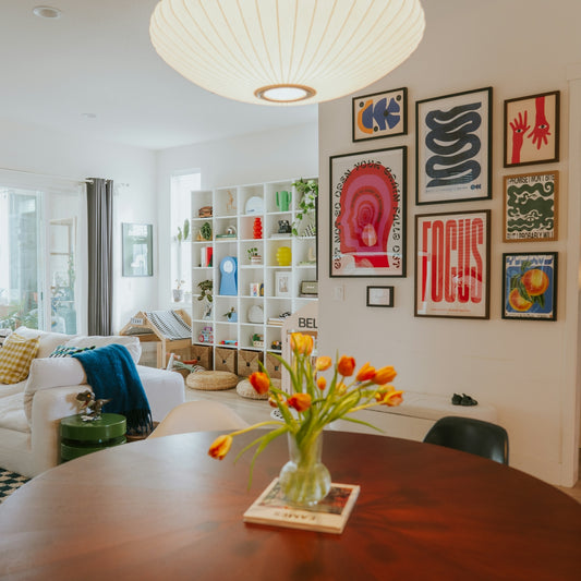 Living room with tulips and framed art