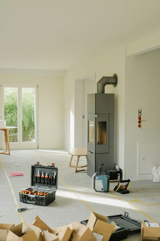 Tools and boxes in a room under renovation