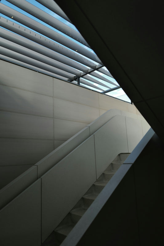 Modern staircase with architectural lighting and sky