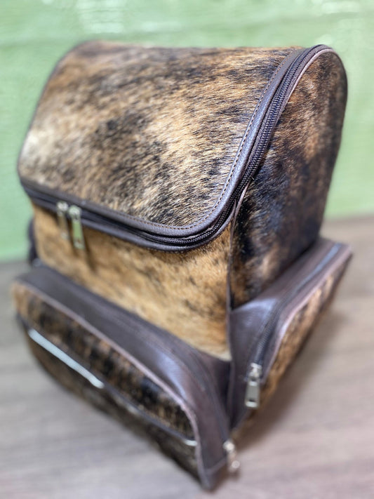 Whether you're heading out for school, travelling or just enjoying an evening out, this cowhide backpack is perfect for holding all of your belongings without straining your shoulders.