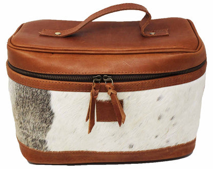 Artisanal cow skin purse, meticulously handcrafted for durability and style, a standout accessory for fashion-forward individuals.