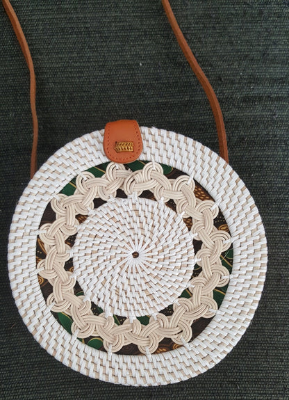 round rattan crossbody bag in wicker vintage style. 