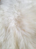 Experience the unparalleled charm of a genuine sheepskin rug. Elevate your decor with the natural beauty and sumptuous texture of this classic accent.