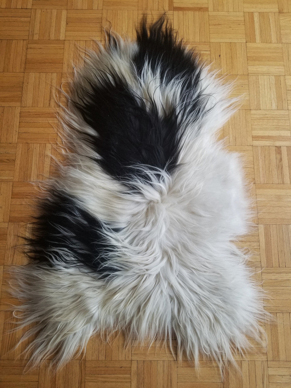 Black and white sheep skin rug natural and organic