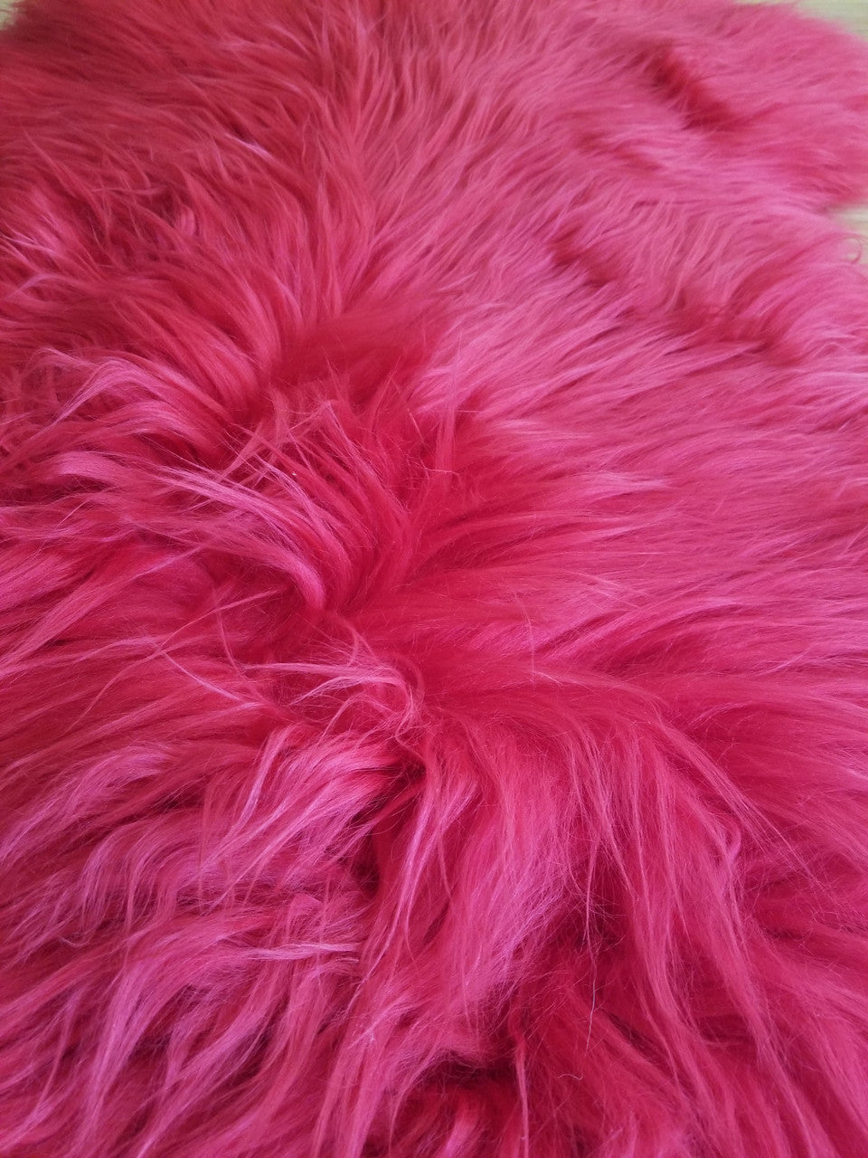 Burgundy pink sheep fur rug