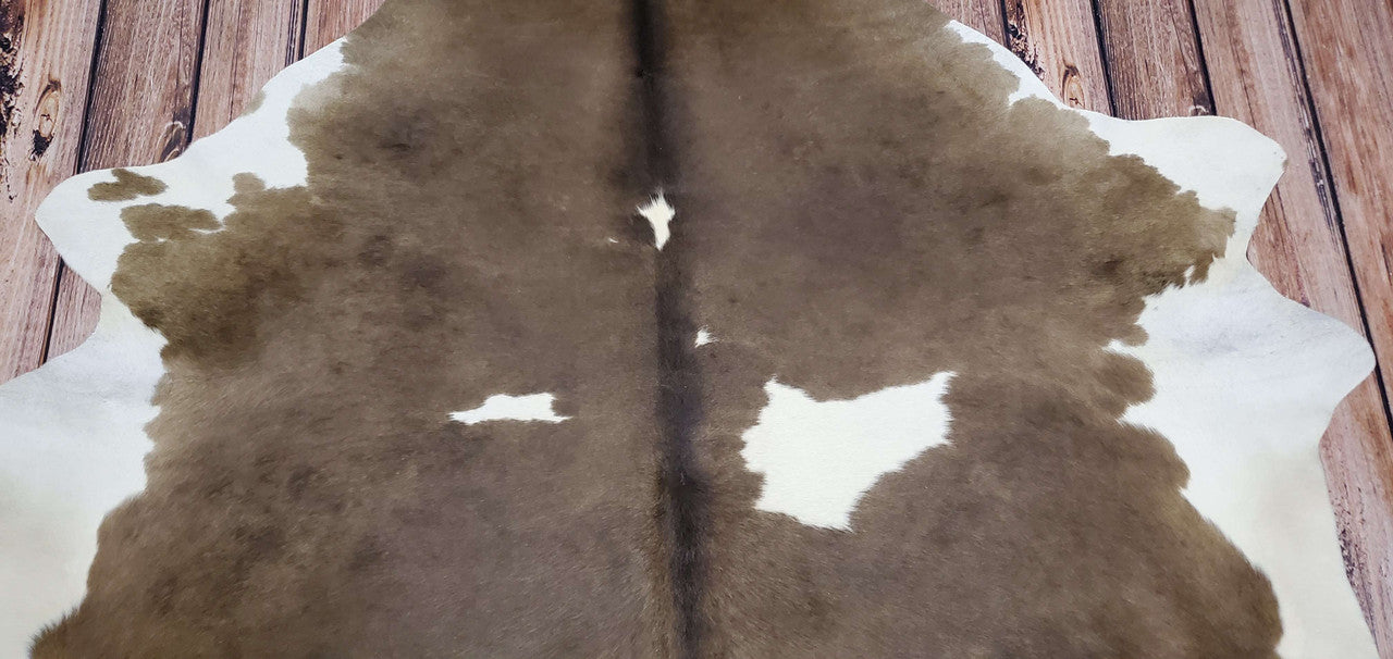 Add a touch of luxury and style to your home with authentic cowhide rugs. Each cowhide carpet is unique, incredibly soft and smooth - perfect for any modern or rustic interior.