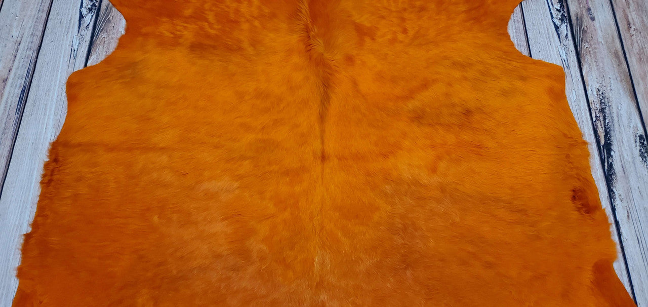 Small Dyed Orange Cowhide Rug 6ft x 5.5ft