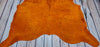 Small Dyed Orange Cowhide Rug 6ft x 5.5ft