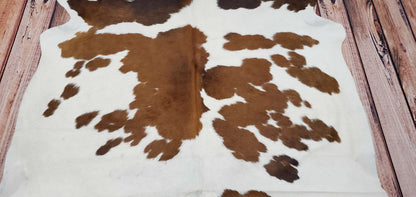 Bring a touch of farmhouse style to your home with a tricolor cowhide rug! Our rugs are soft and smooth, adding the perfect neutral accent to any room.