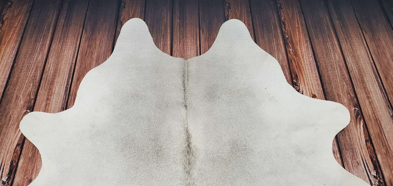 Keep the boring vibes at the bay and buy this cowhide rug. 
