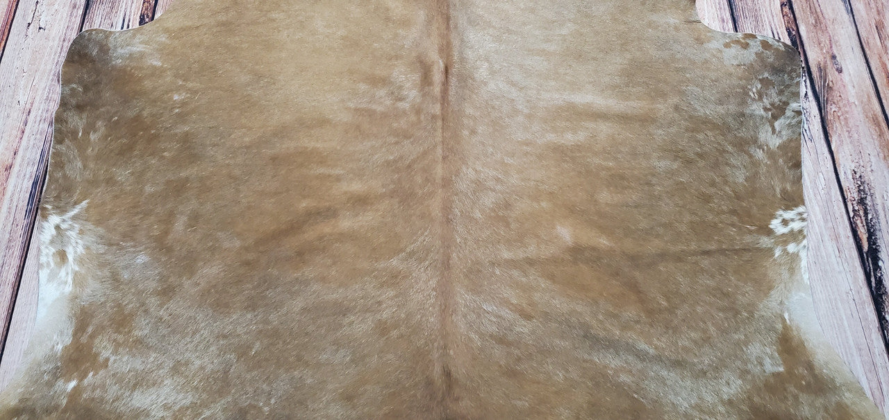 Decor Hut’s beige cowhide rugs make it easy to find one that fits perfectly with your style. Not only can these carpets add texture and colour to any space they are also incredibly practical; they are easy to clean and extremely hardwearing which makes them suitable for high traffic areas like living rooms or hallways. 