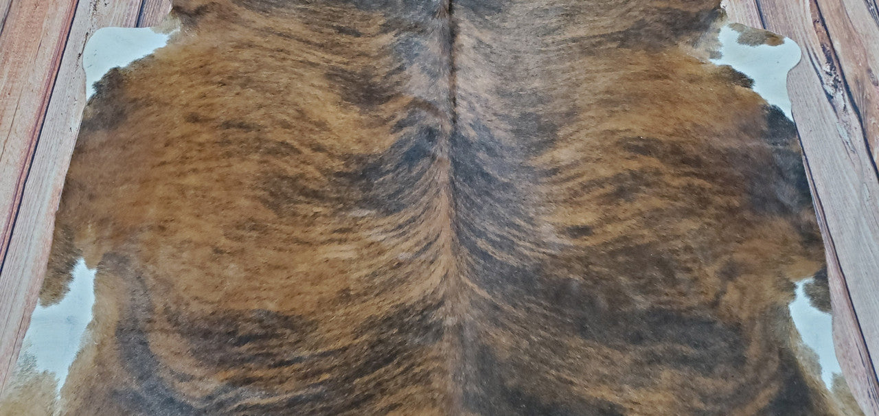 This brindle cowhide rug will look stunning in any modern farmhouse. 