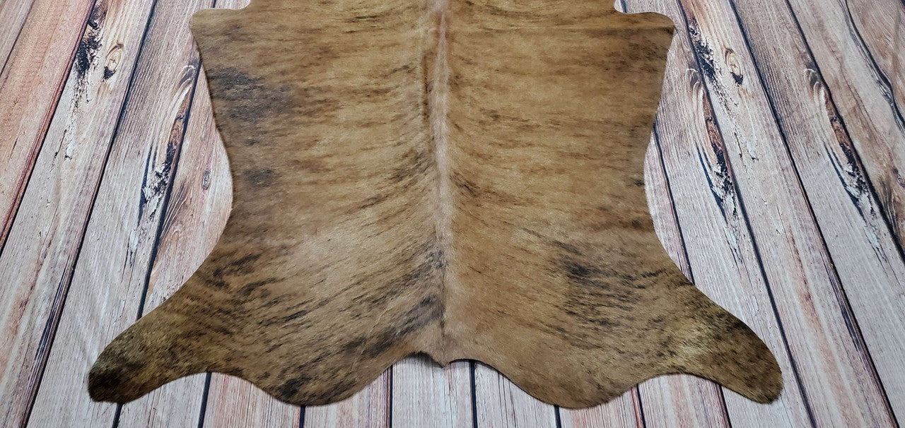 This tiny cow hide rug in Canada is ideal for an additional touch of color and texture in your interior. Soft, beautifully textured, and natural show signs of wear and wear, and the colors and design are unique.